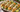 Gegrillter Mais mit Limettencreme, Feta, Koriander und Limette